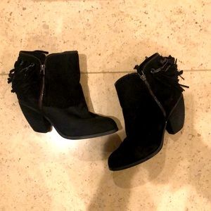 Not rated black booties